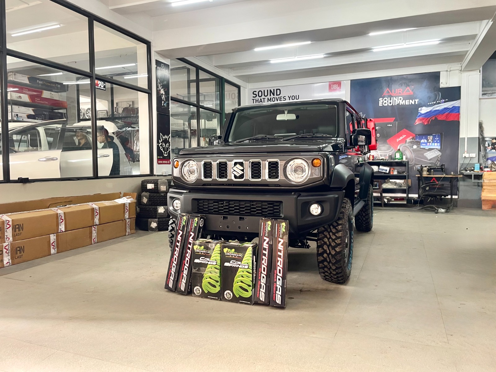 Suzuki Jimny with Ironman Nitrogas suspension kit inside Screwdriver workshop Dimapur